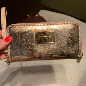Rose gold Michael kors wristlet!